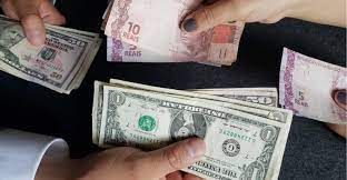 Dólar fecha em R$ 5,16 e atinge menor valor em 20 meses